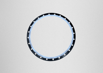 テフロンクッションパッキン 大口径リングの加工事例　多穴精密カットと優れたシール性の実現　株式会社ダイコー